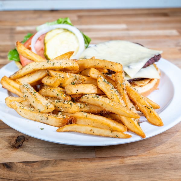 Brisket burger with Swiss cheese and seasoned fries