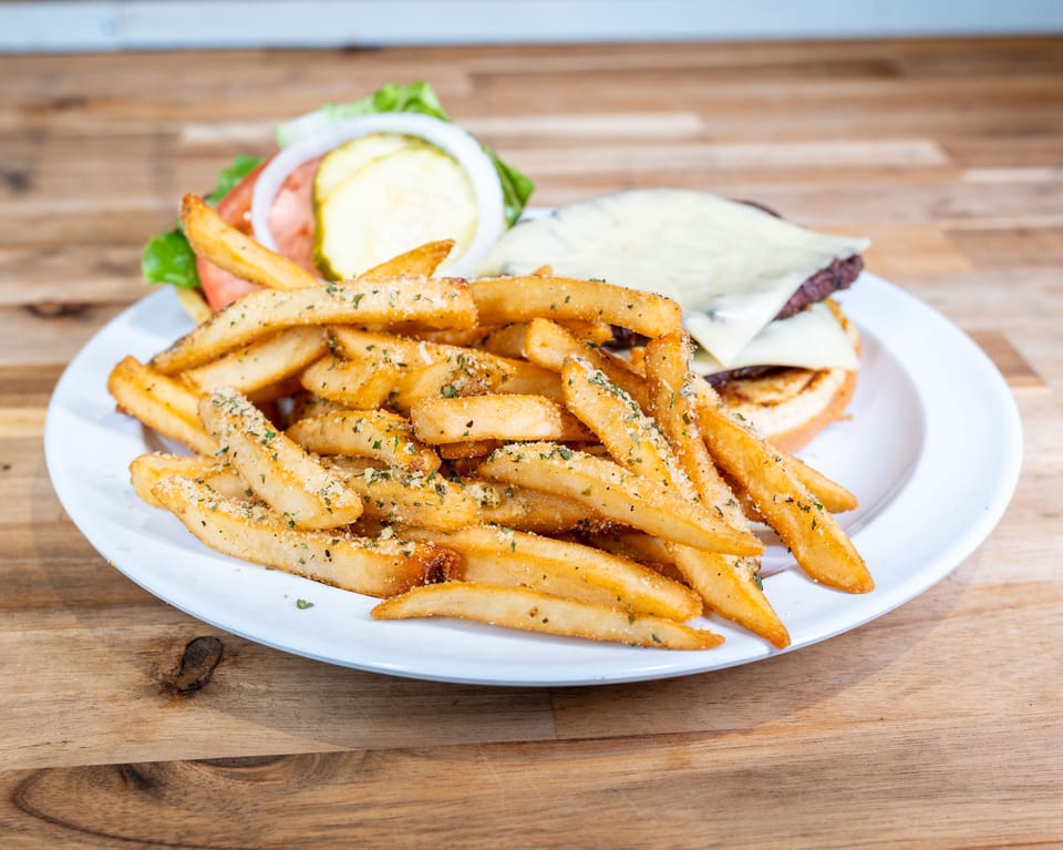 Brisket burger with Swiss cheese and seasoned fries